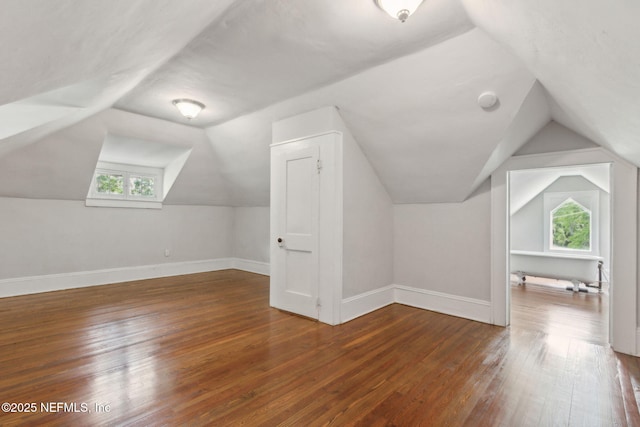 4949 Fremont St, Jacksonville, FL 32210 - bonus room featuring vaulted ceiling, a healthy amount of sunlight, and hardwood / wood-style floors