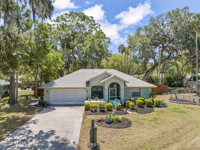 ranch-style house featuring fence, roof with shingles, a garage, stucco siding, and driveway