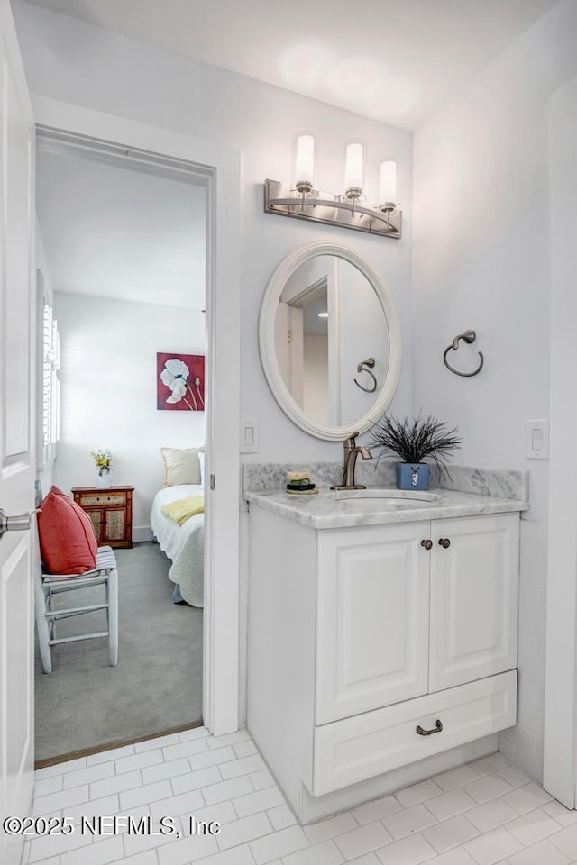 2325 Seminole Rd, Atlantic Beach, FL 32233 - bathroom featuring vanity, ensuite bath, and tile patterned floors
