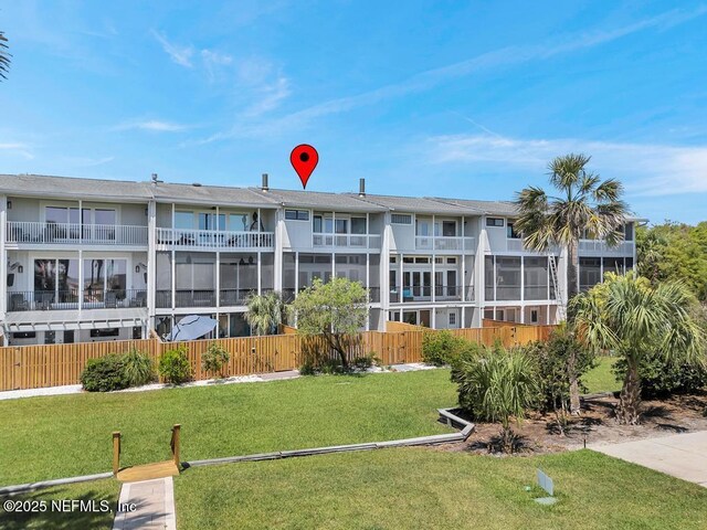 2325 Seminole Rd, Atlantic Beach, FL 32233 - view of building exterior with fence