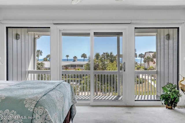 2325 Seminole Rd, Atlantic Beach, FL 32233 - bedroom with multiple windows, access to outside, and carpet floors