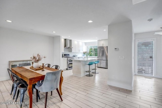 2325 Seminole Rd, Atlantic Beach, FL 32233 - dining space featuring light wood finished floors, baseboards, and recessed lighting