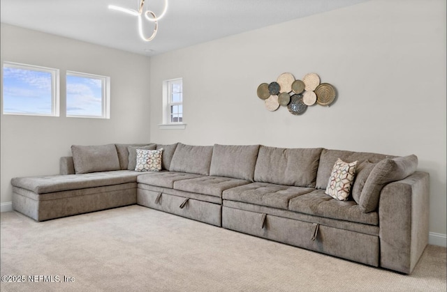 462 Hillendale Cir, Saint Johns, FL 32259 - living area featuring baseboards, carpet flooring, and a notable chandelier