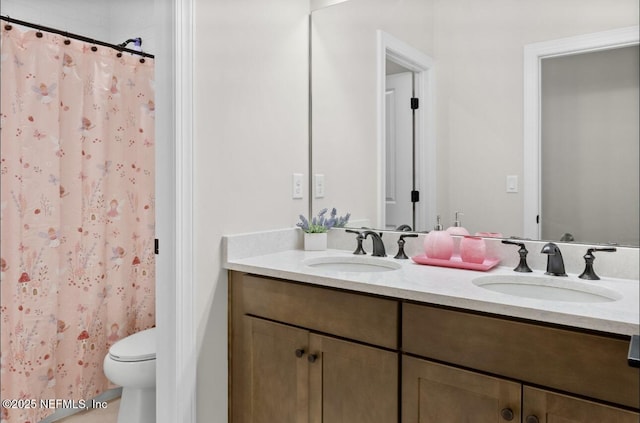 462 Hillendale Cir, Saint Johns, FL 32259 - bathroom with double vanity, a sink, toilet, and a shower with curtain