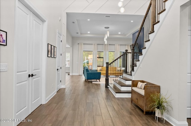 462 Hillendale Cir, Saint Johns, FL 32259 - entryway featuring baseboards, stairway, wood finished floors, and a raised ceiling