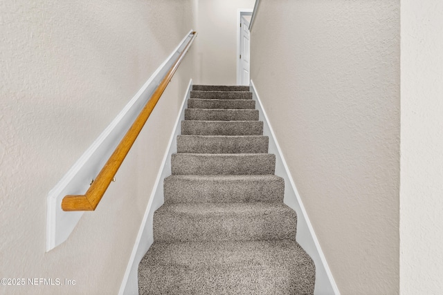 1879 Lago Del Sur Dr, Middleburg, FL 32068 - staircase featuring a textured wall