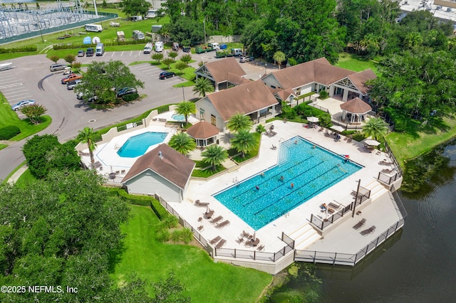 birds eye view of property featuring a water view
