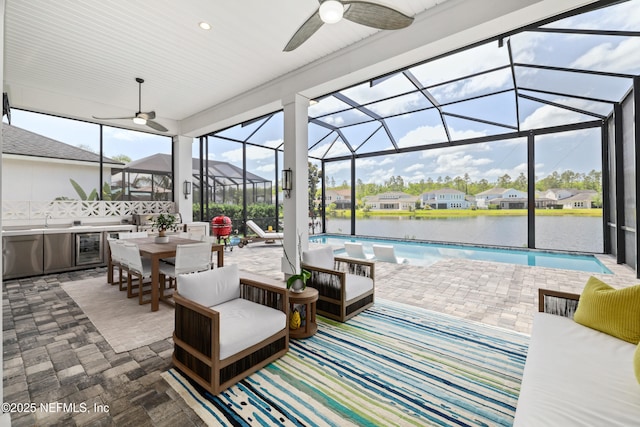 742 Honey Blossom Rd, Saint Johns, FL 32259 - view of patio with a ceiling fan, wine cooler, exterior kitchen, and an outdoor pool