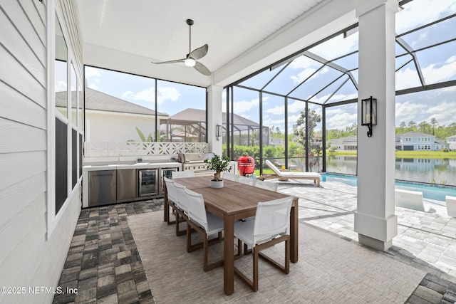 742 Honey Blossom Rd, Saint Johns, FL 32259 - sunroom featuring exterior kitchen, a ceiling fan, a swimming pool, and outdoor dining area