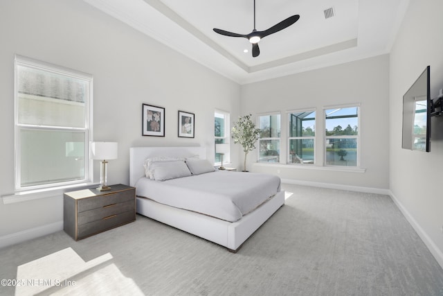742 Honey Blossom Rd, Saint Johns, FL 32259 - bedroom featuring light colored carpet, a ceiling fan, baseboards, a tray ceiling, and visible vents