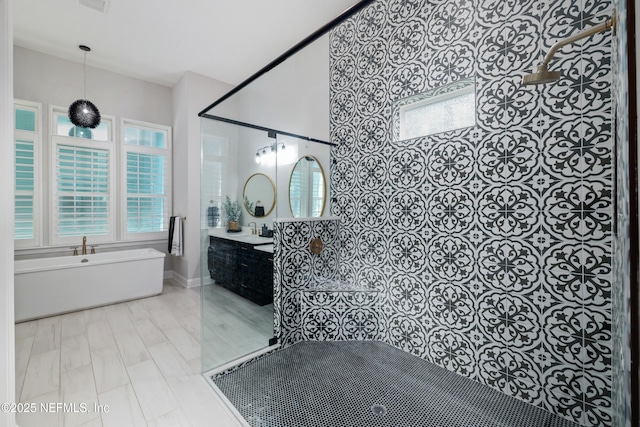 742 Honey Blossom Rd, Saint Johns, FL 32259 - bathroom featuring a freestanding bath, tiled shower, and vanity