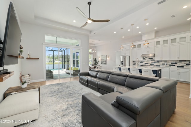 742 Honey Blossom Rd, Saint Johns, FL 32259 - living room with light wood-type flooring, a ceiling fan, recessed lighting, and visible vents