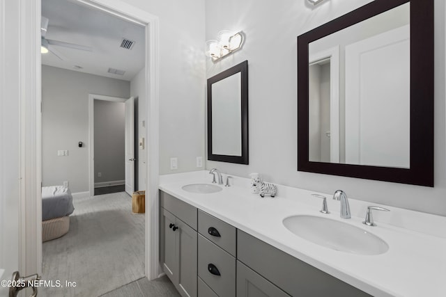 742 Honey Blossom Rd, Saint Johns, FL 32259 - bathroom featuring double vanity, ceiling fan, visible vents, and a sink