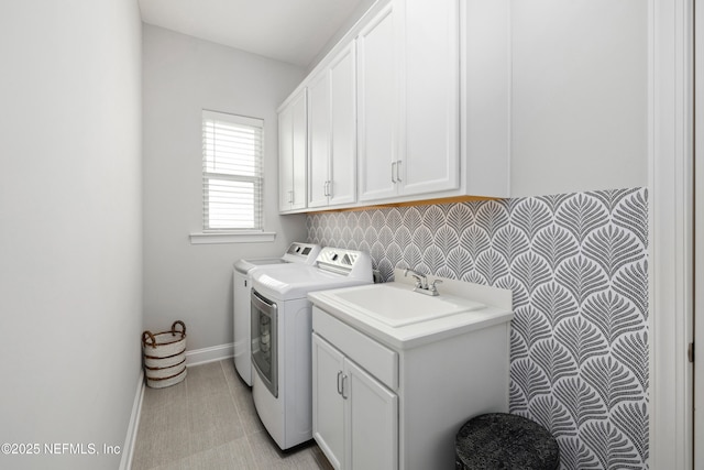742 Honey Blossom Rd, Saint Johns, FL 32259 - laundry room with cabinet space, baseboards, and washer and clothes dryer