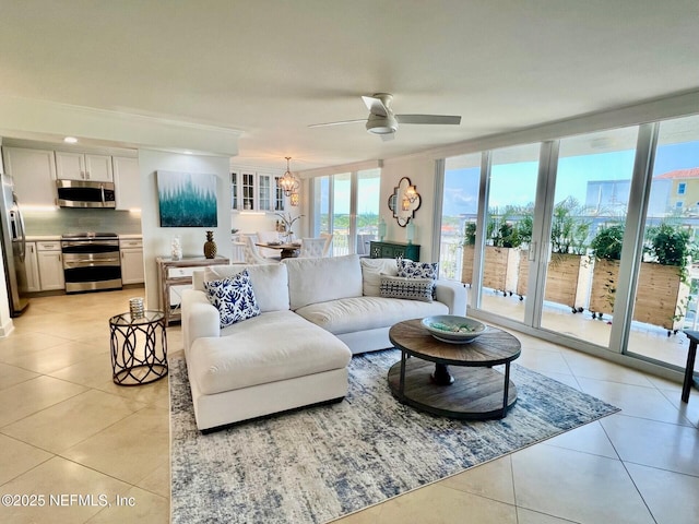 1601 Ocean Dr S Unit 701, Jacksonville Beach, FL 32250 - living room featuring light tile patterned flooring, ceiling fan, and a chandelier