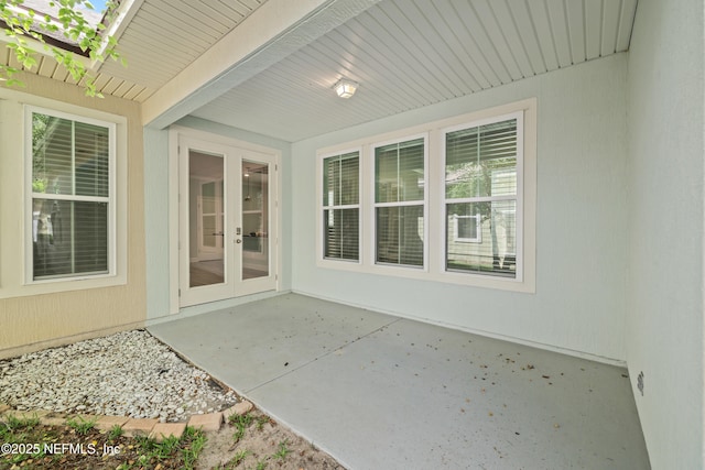 view of patio featuring french doors