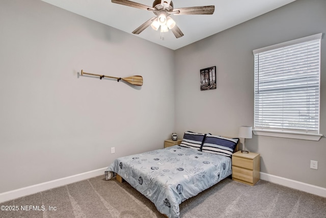 85325 Champlain Dr, Fernandina Beach, FL 32034 - bedroom featuring baseboards, carpet flooring, and ceiling fan