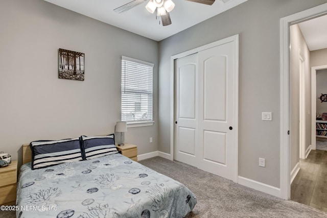 85325 Champlain Dr, Fernandina Beach, FL 32034 - bedroom with a closet, baseboards, ceiling fan, and carpet