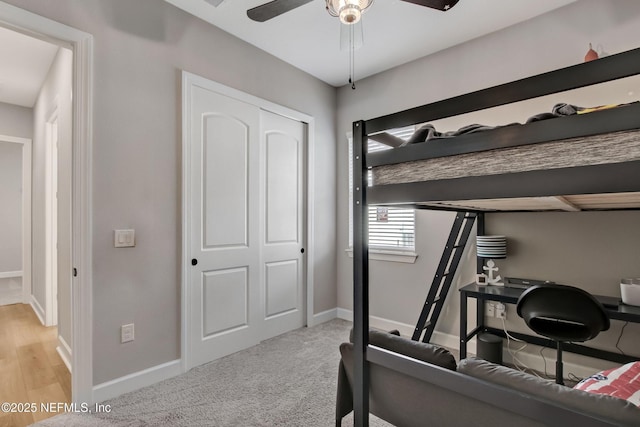 85325 Champlain Dr, Fernandina Beach, FL 32034 - bedroom with baseboards, ceiling fan, and a closet