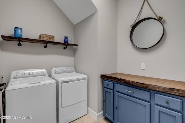 85325 Champlain Dr, Fernandina Beach, FL 32034 - laundry area featuring washing machine and clothes dryer and cabinet space