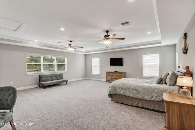 85325 Champlain Dr, Fernandina Beach, FL 32034 - bedroom featuring a tray ceiling, baseboards, light carpet, recessed lighting, and ceiling fan