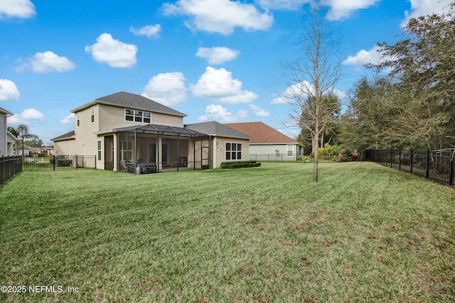 85325 Champlain Dr, Fernandina Beach, FL 32034 - back of house with a sunroom