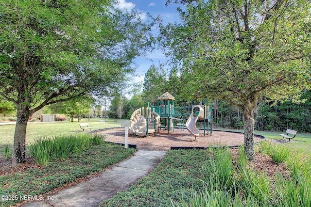 85325 Champlain Dr, Fernandina Beach, FL 32034 - communal playground featuring a lawn and view of scattered trees