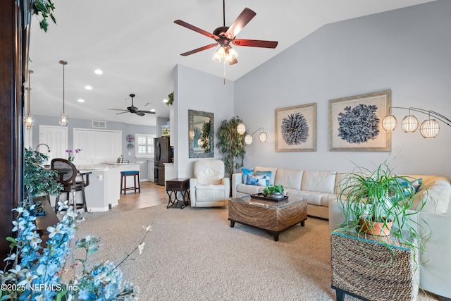 24 Fawn Gully Ln Unit E, Ponte Vedra, FL 32081 - living room with a ceiling fan, recessed lighting, vaulted ceiling, and light carpet