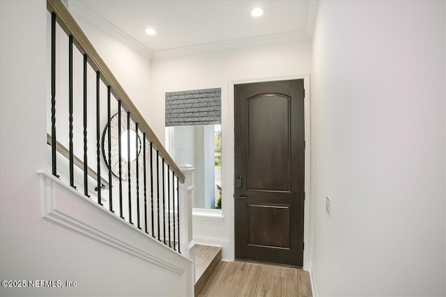 109 Rimini Ct, Jacksonville, FL 32225 - foyer with wood finished floors, stairway, ornamental molding, recessed lighting, and baseboards