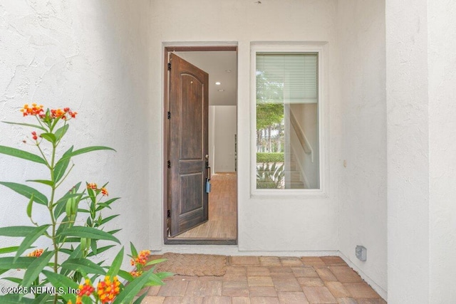 109 Rimini Ct, Jacksonville, FL 32225 - doorway to property with stucco siding