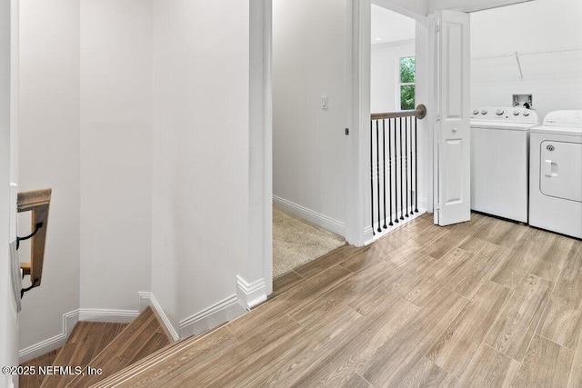 109 Rimini Ct, Jacksonville, FL 32225 - laundry room with separate washer and dryer, light wood-style flooring, and baseboards