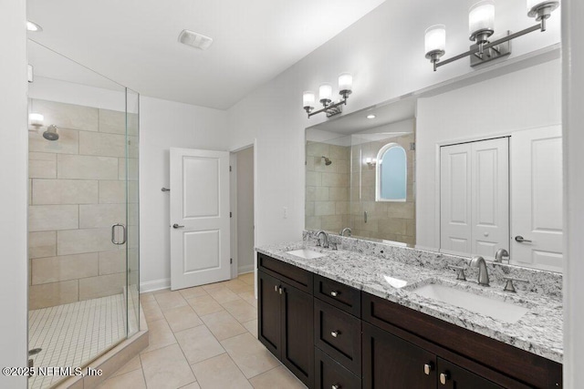 109 Rimini Ct, Jacksonville, FL 32225 - bathroom with a stall shower, double vanity, tile patterned floors, and baseboards