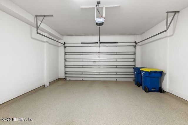 109 Rimini Ct, Jacksonville, FL 32225 - garage featuring a garage door opener and baseboards