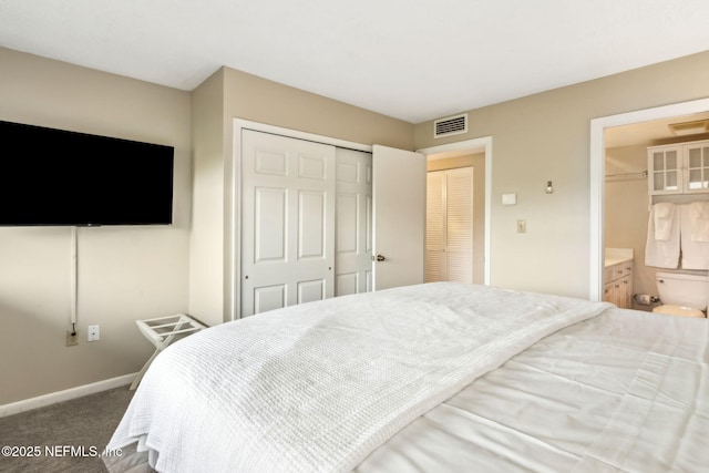 1107 Beach Walker Rd Unit 1107, Amelia Island, FL 32034 - bedroom with baseboards, visible vents, carpet, and a closet