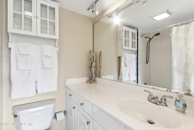 1107 Beach Walker Rd Unit 1107, Amelia Island, FL 32034 - bathroom with toilet, a shower with shower curtain, and vanity