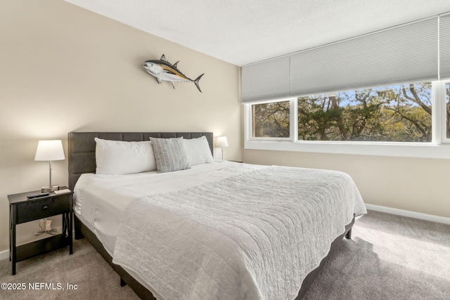 1107 Beach Walker Rd Unit 1107, Amelia Island, FL 32034 - bedroom with baseboards and carpet