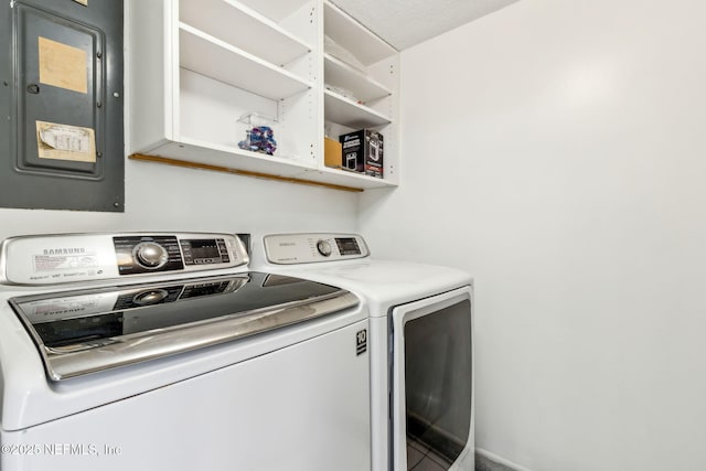 1107 Beach Walker Rd Unit 1107, Amelia Island, FL 32034 - laundry room with washing machine and clothes dryer, laundry area, and electric panel