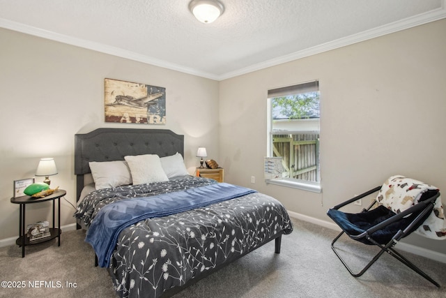 bedroom with carpet flooring, ornamental molding, baseboards, and a textured ceiling