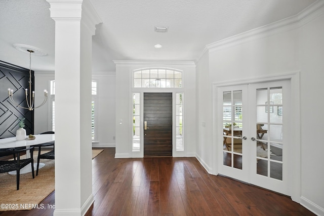 13815 Admirals Bend Dr, Jacksonville, FL 32225 - entrance foyer with crown molding, baseboards, french doors, and hardwood / wood-style floors