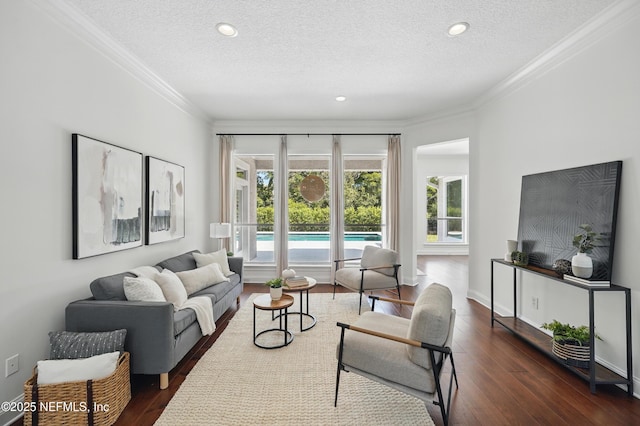 13815 Admirals Bend Dr, Jacksonville, FL 32225 - living room featuring crown molding, recessed lighting, a textured ceiling, and dark wood-type flooring