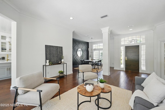 13815 Admirals Bend Dr, Jacksonville, FL 32225 - living area featuring recessed lighting, decorative columns, ornamental molding, and wood finished floors