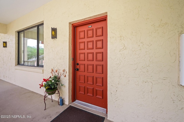 1830 Sevilla Blvd Unit 208, Atlantic Beach, FL 32233 - view of exterior entry featuring stucco siding