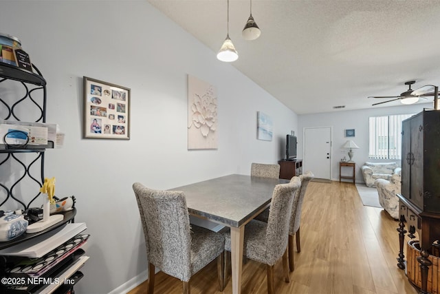 1830 Sevilla Blvd Unit 208, Atlantic Beach, FL 32233 - dining space with light wood-style floors and a ceiling fan
