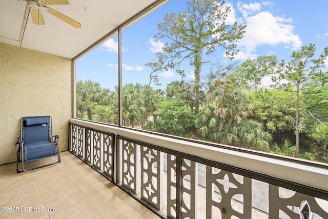 1830 Sevilla Blvd Unit 208, Atlantic Beach, FL 32233 - balcony featuring a ceiling fan and view of scattered trees
