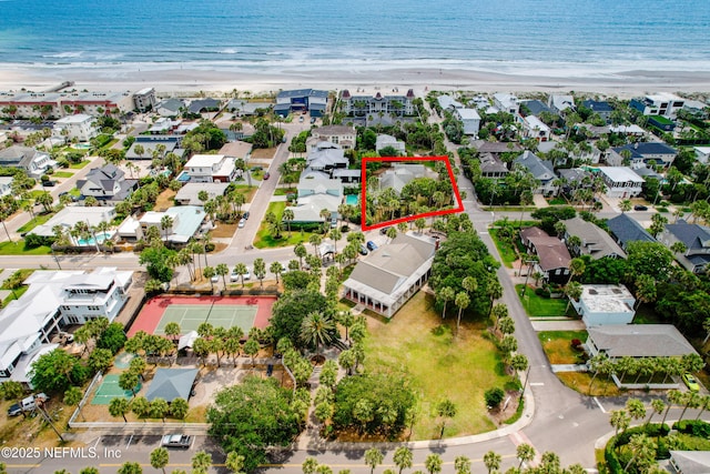 aerial view of residential area featuring unending shoreline and property parcel outlined