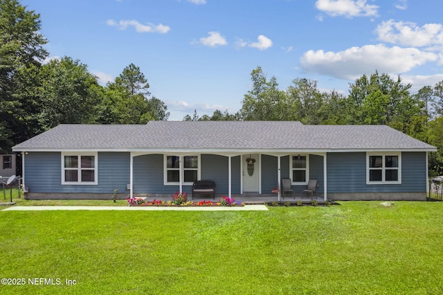 ranch-style house featuring roof with shingles, a porch, and a front lawn