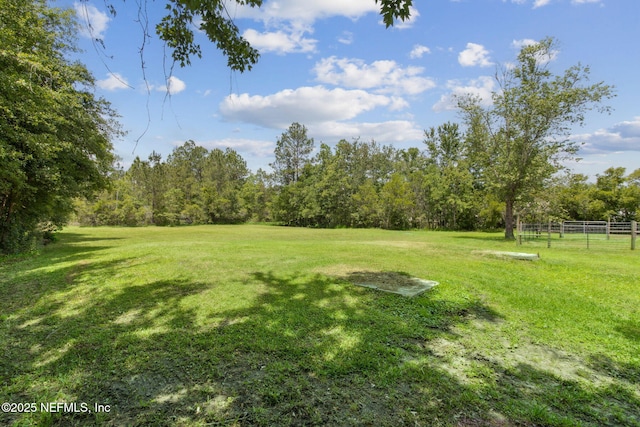 view of yard featuring fence