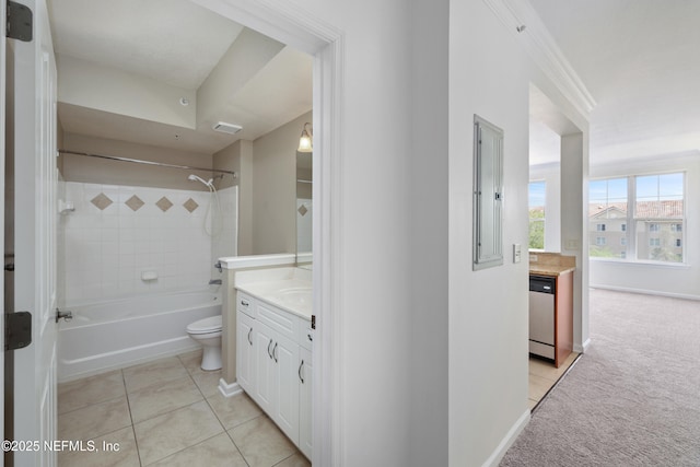 full bath featuring toilet, tile patterned floors, bathtub / shower combination, and vanity