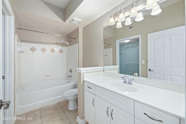 full bath featuring tile patterned flooring, vanity, toilet, shower / bathing tub combination, and visible vents
