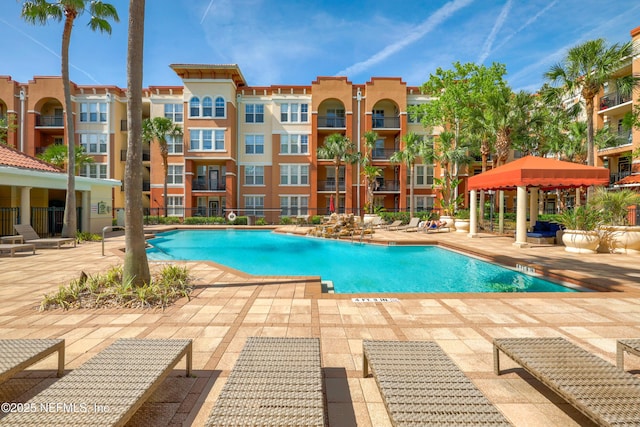 community pool featuring a patio